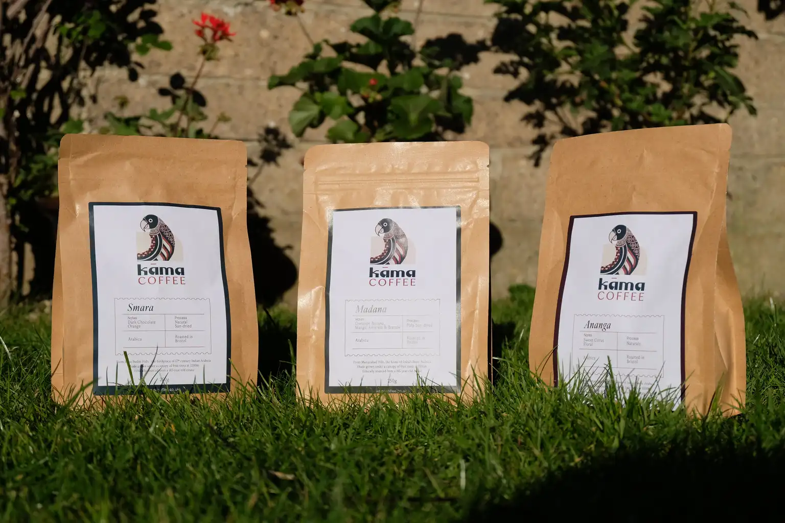 Three bags of Kāma Coffee